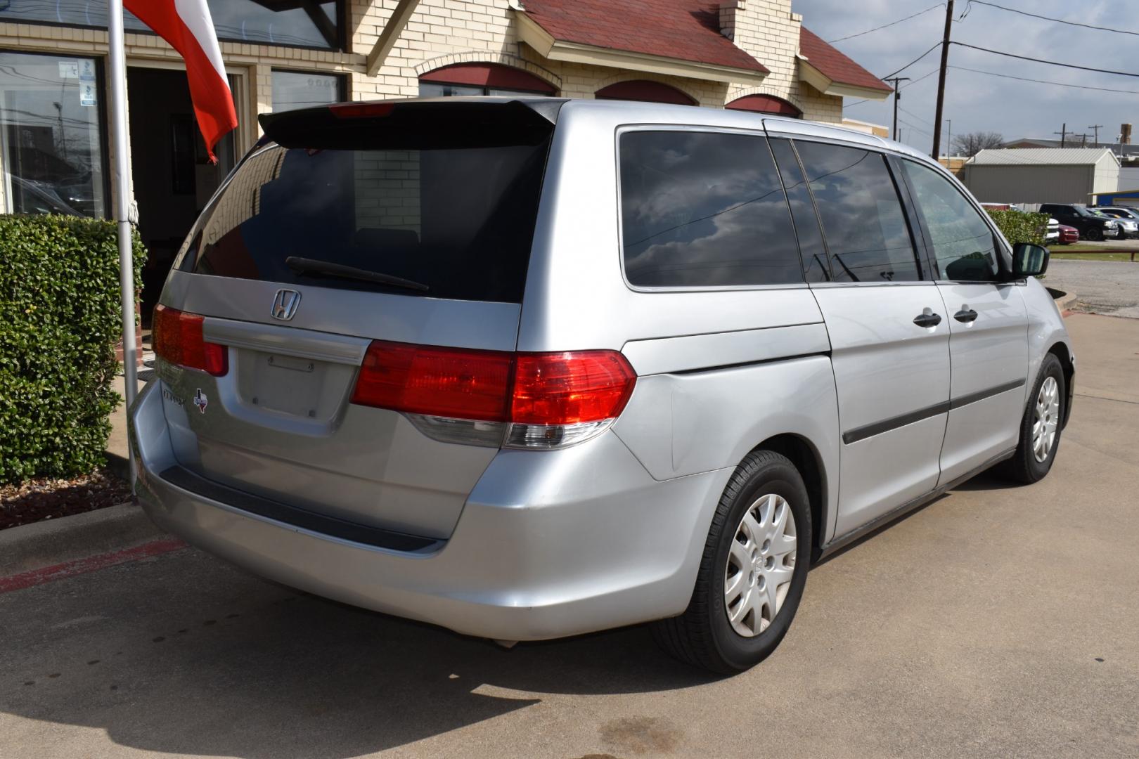 2010 Silver /Gray Honda Odyssey (5FNRL3H25AB) , located at 5925 E. BELKNAP ST., HALTOM CITY, TX, 76117, (817) 834-4222, 32.803799, -97.259003 - Buying a 2010 Honda Odyssey LX can offer several benefits, including: Reliability: Honda is known for its reliability, and the Odyssey is no exception. The 2010 model is likely to have a solid reputation for dependability. Safety: The 2010 Odyssey LX comes equipped with standard safety features su - Photo#4